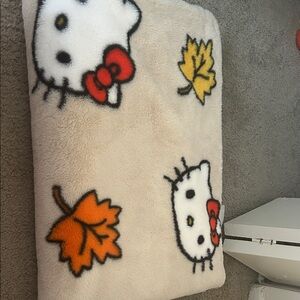 Sanrio Hello Kitty Beige Blanket with Red and Yellow Accents
